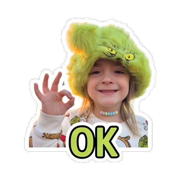 Child in green hat making OK hand sign with text OK Grinchy Kid Moods sticker for expressive chats and social replies.